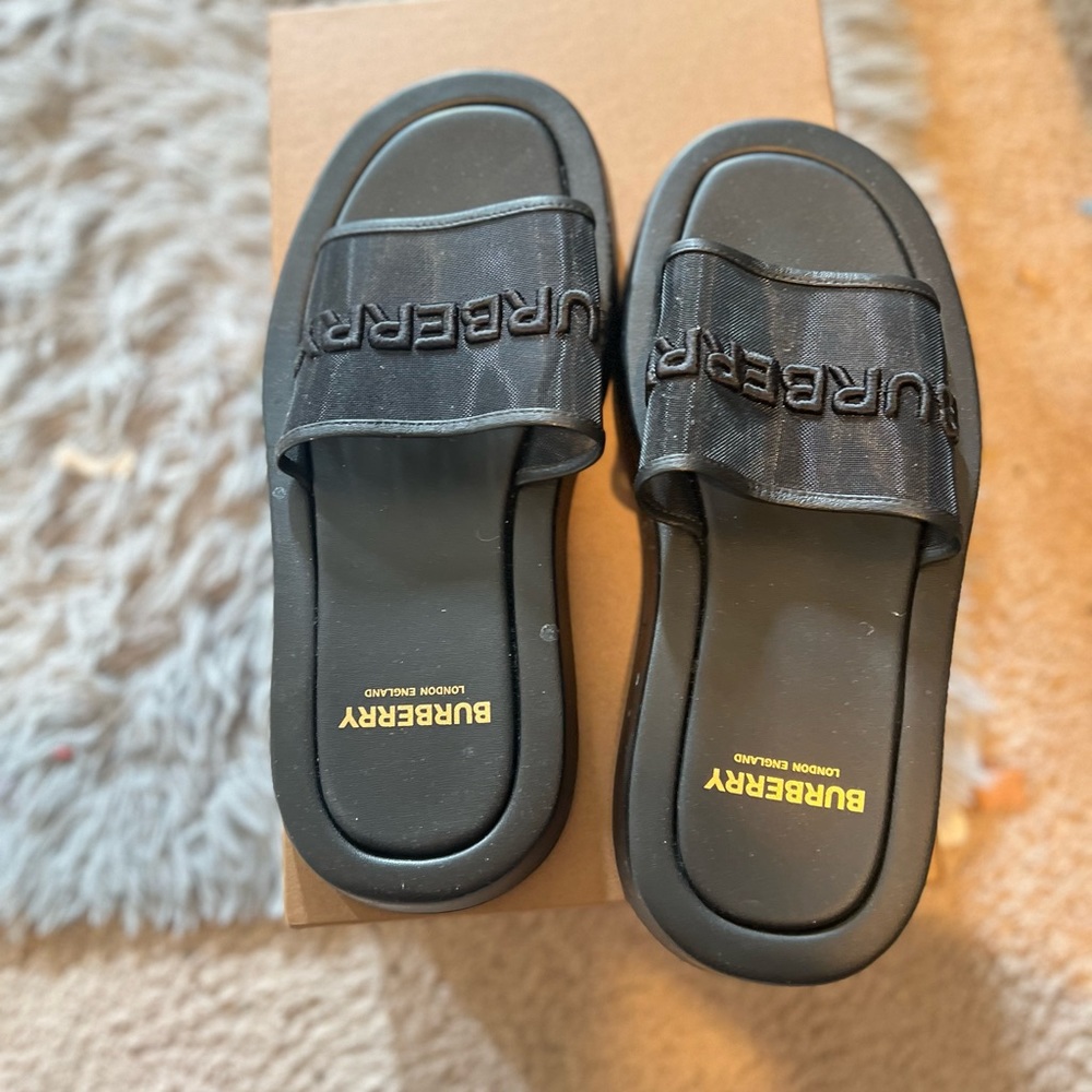 Black Burberry slides